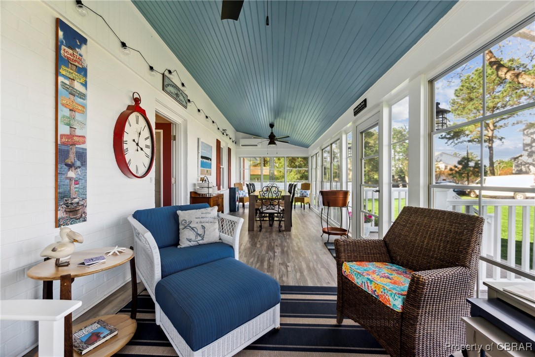 298 Old Ferry Road Hudgins, VA 23076 - Photo 5 of 48 Sunroom / solarium with outdoor lounge area, a ceiling fan, and outdoor dining area