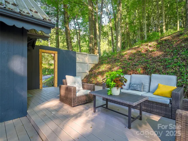 a outdoor living space with furniture and a potted plant