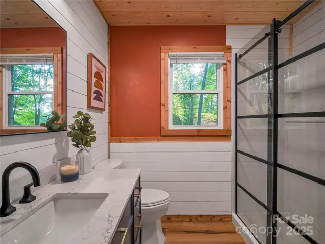 a bathroom with a sink and a window