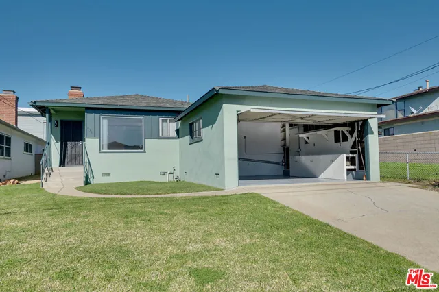 a view of a house with a patio