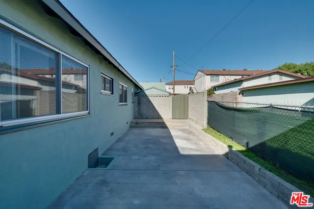 a view of a hallway with a fireplace