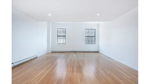 a picture of a person on a white wall