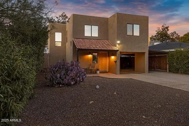 a very nice looking house with a yard