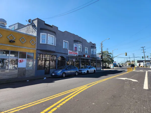 a view of a street with cars