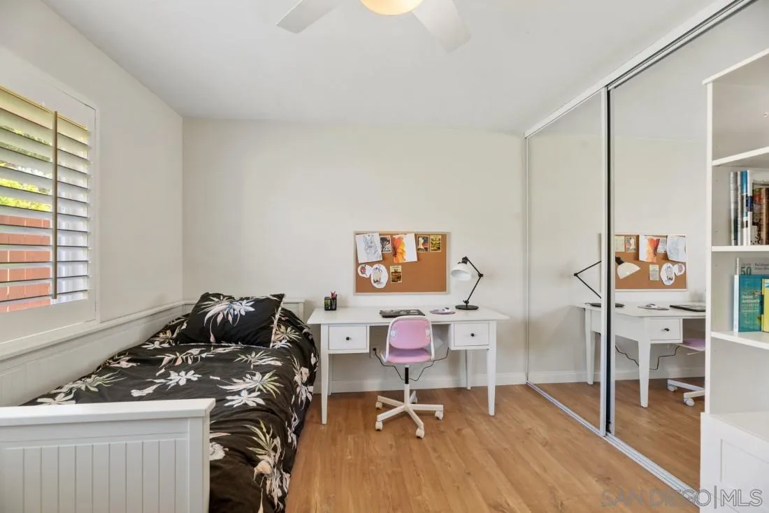 12730 Rios Road San Diego, CA 92128 - Photo 16 of 31 a view of a workspace with furniture and a window