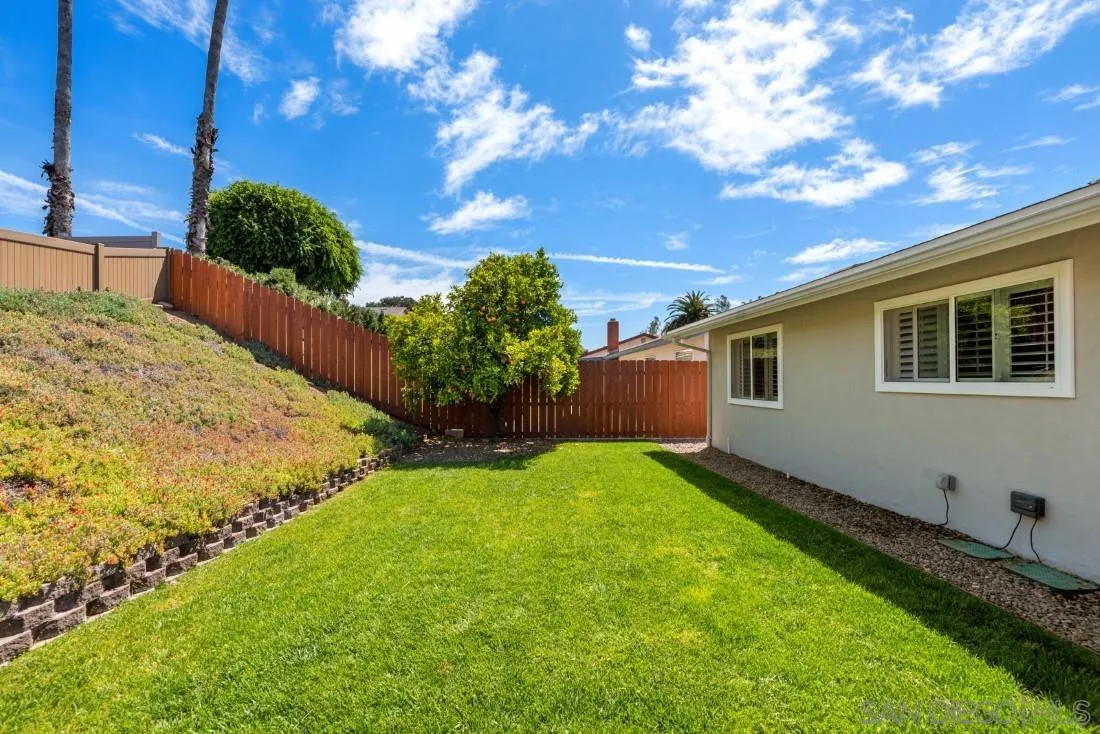 12730 Rios Road San Diego, CA 92128 - Photo 28 of 31 a backyard of a house with lots of green space