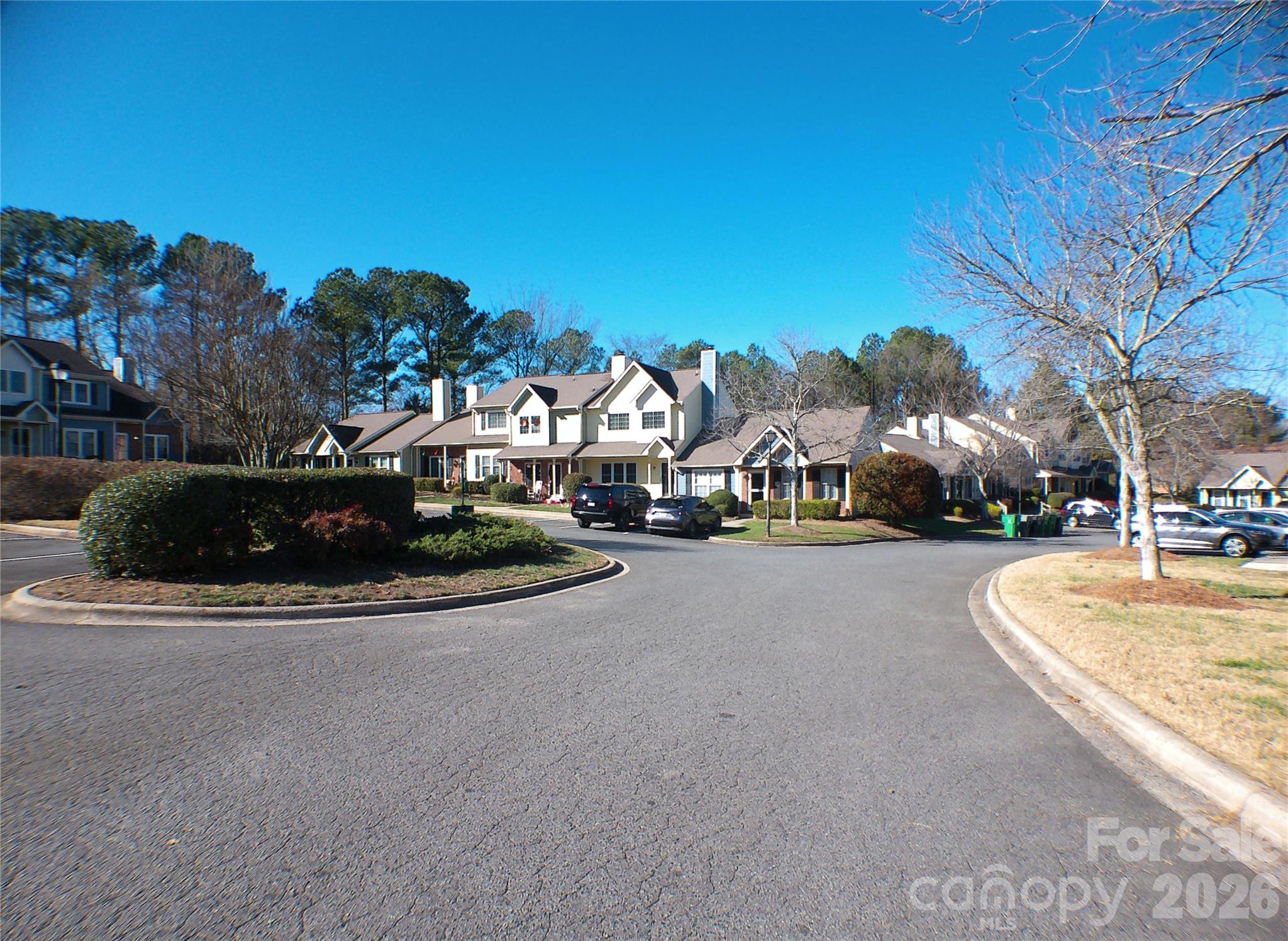 9112 4 Mile Creek Road Charlotte, NC 28277 - Photo 2 of 22 a view of a street with houses