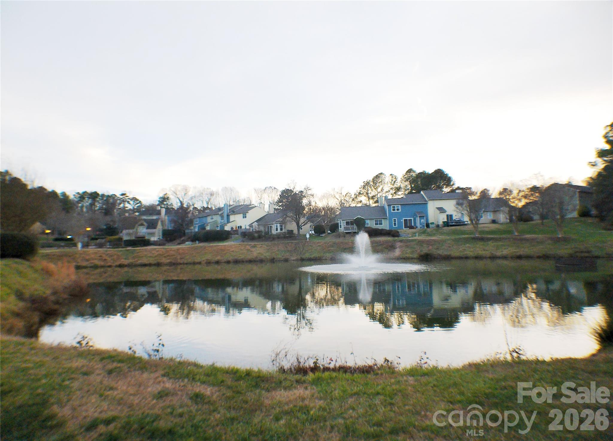 9112 4 Mile Creek Road Charlotte, NC 28277 - Photo 22 of 22 a view of a lake with houses