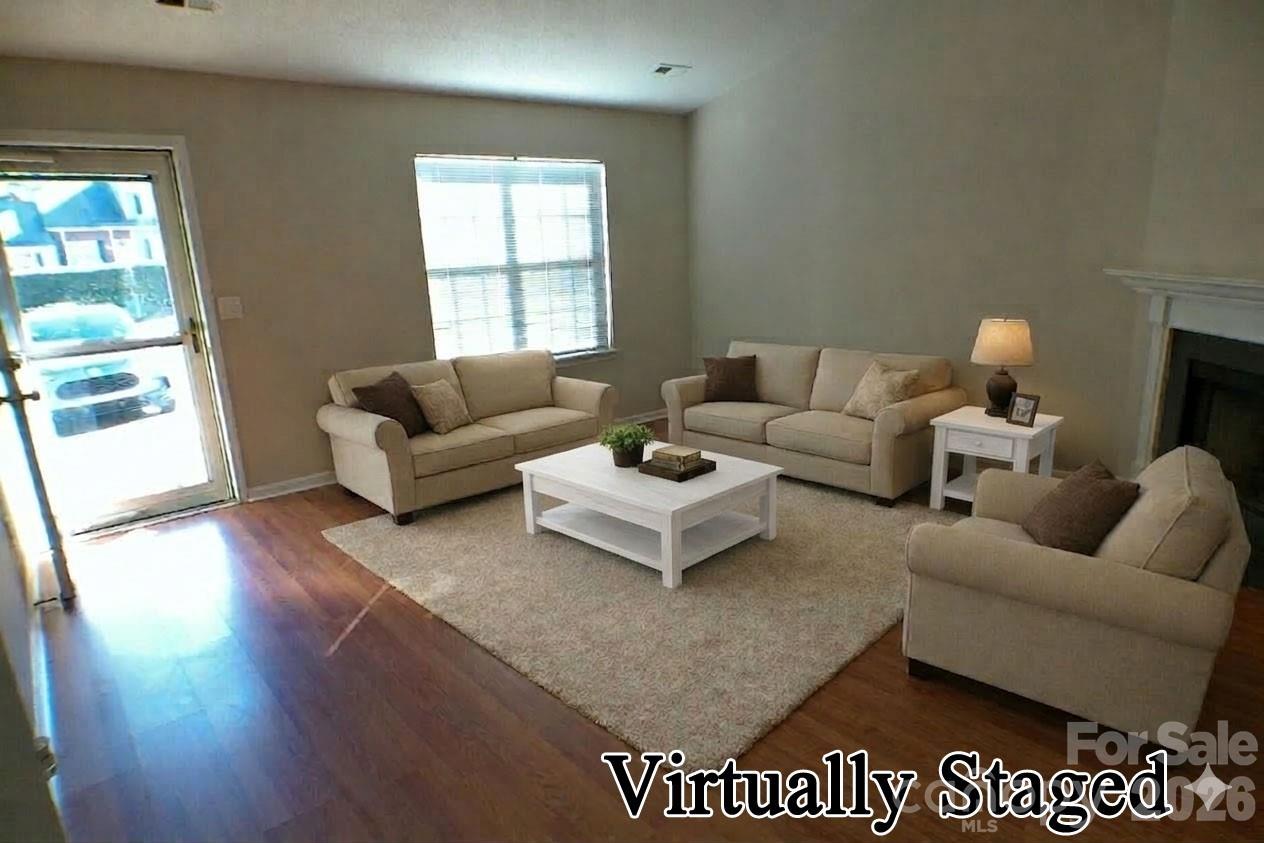 9112 4 Mile Creek Road Charlotte, NC 28277 - Photo 4 of 22 a living room with furniture and a large window
