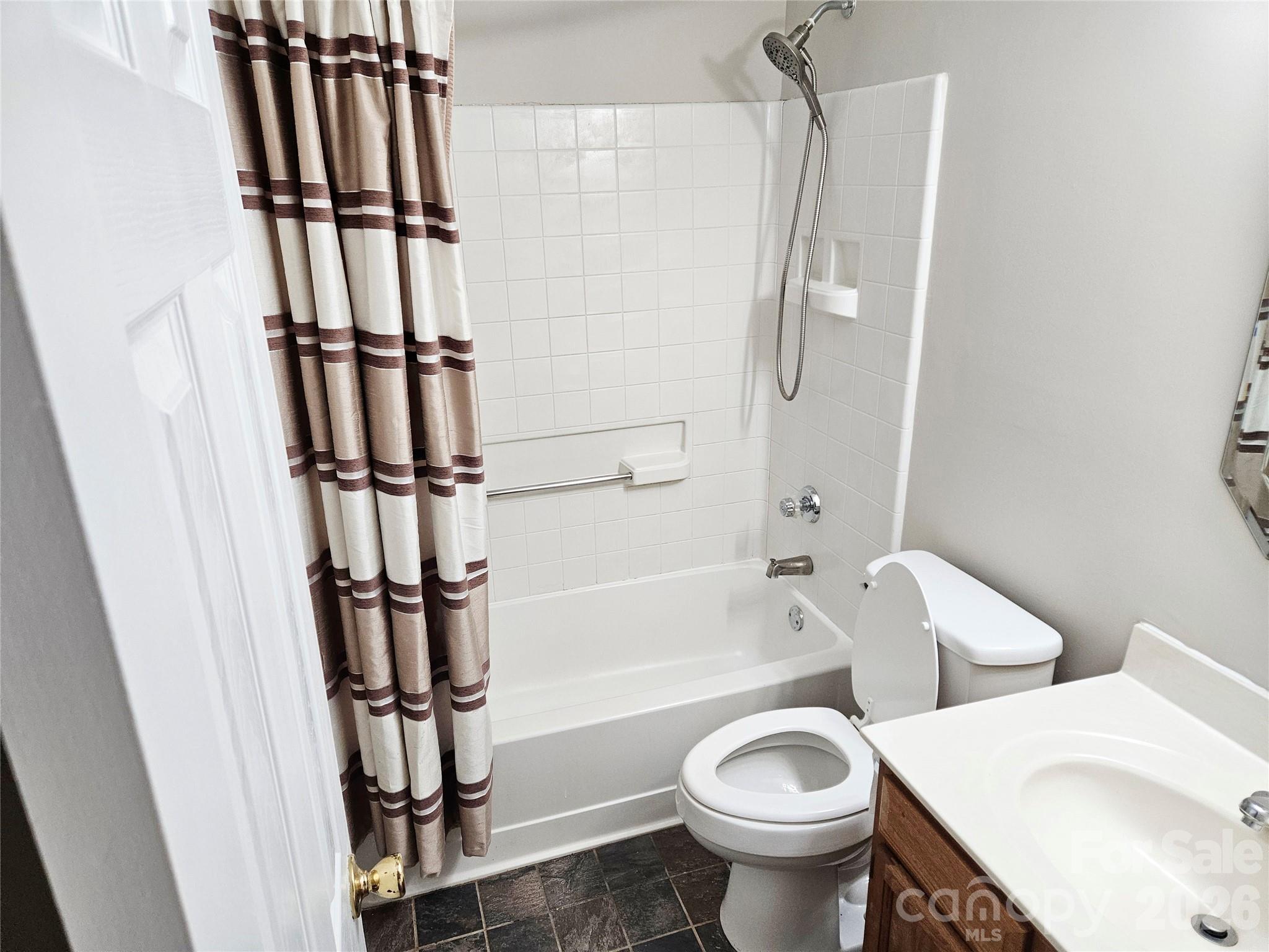 9112 4 Mile Creek Road Charlotte, NC 28277 - Photo 6 of 22 a bathroom with a toilet and a shower