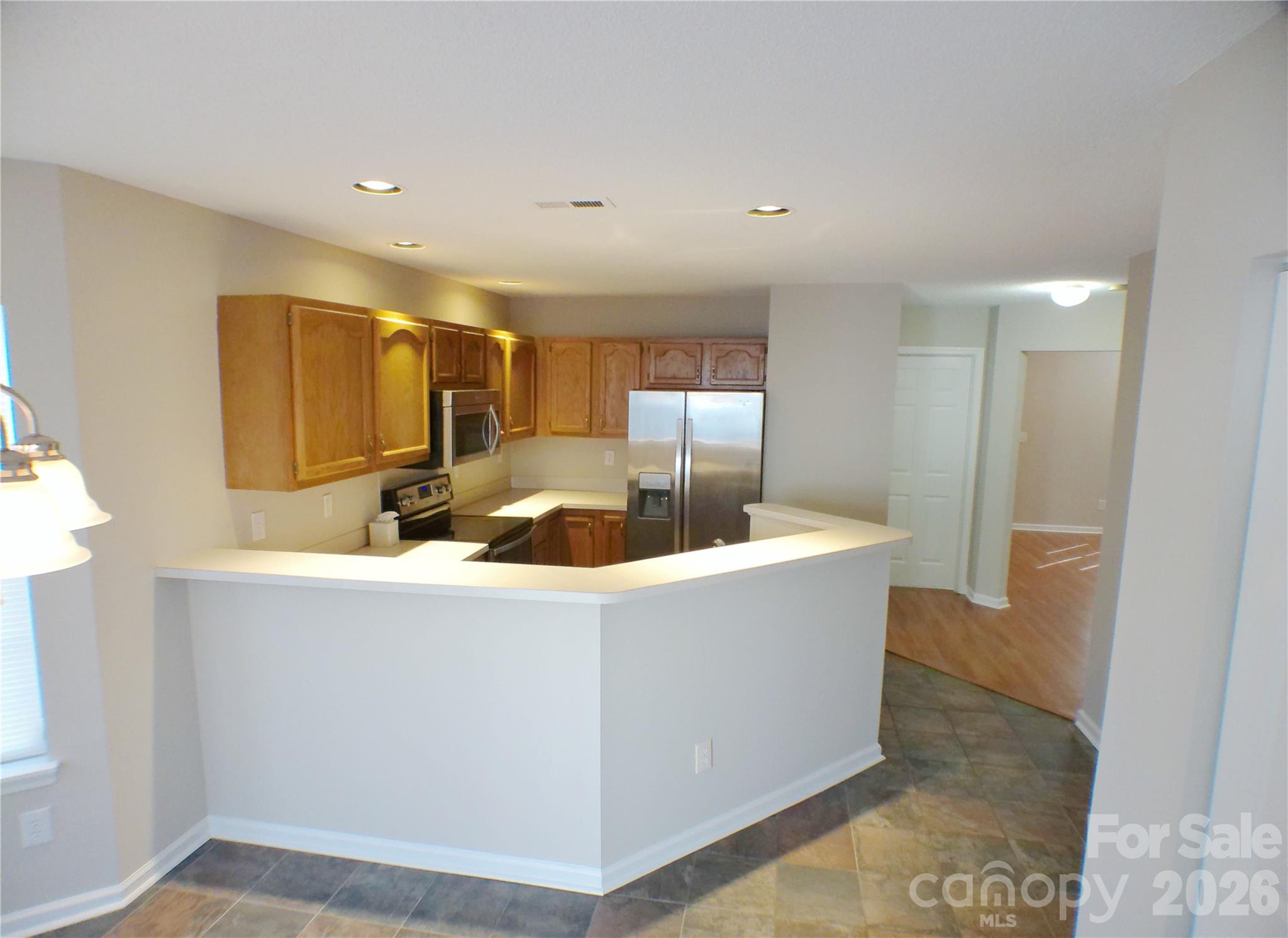9112 4 Mile Creek Road Charlotte, NC 28277 - Photo 7 of 22 a view of kitchen with stainless steel appliances granite countertop sink