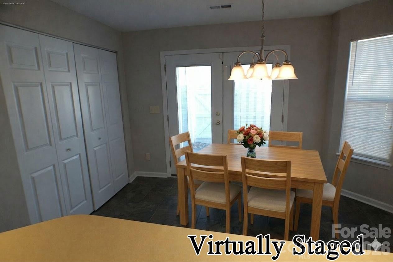 9112 4 Mile Creek Road Charlotte, NC 28277 - Photo 8 of 22 a dining room with furniture and window