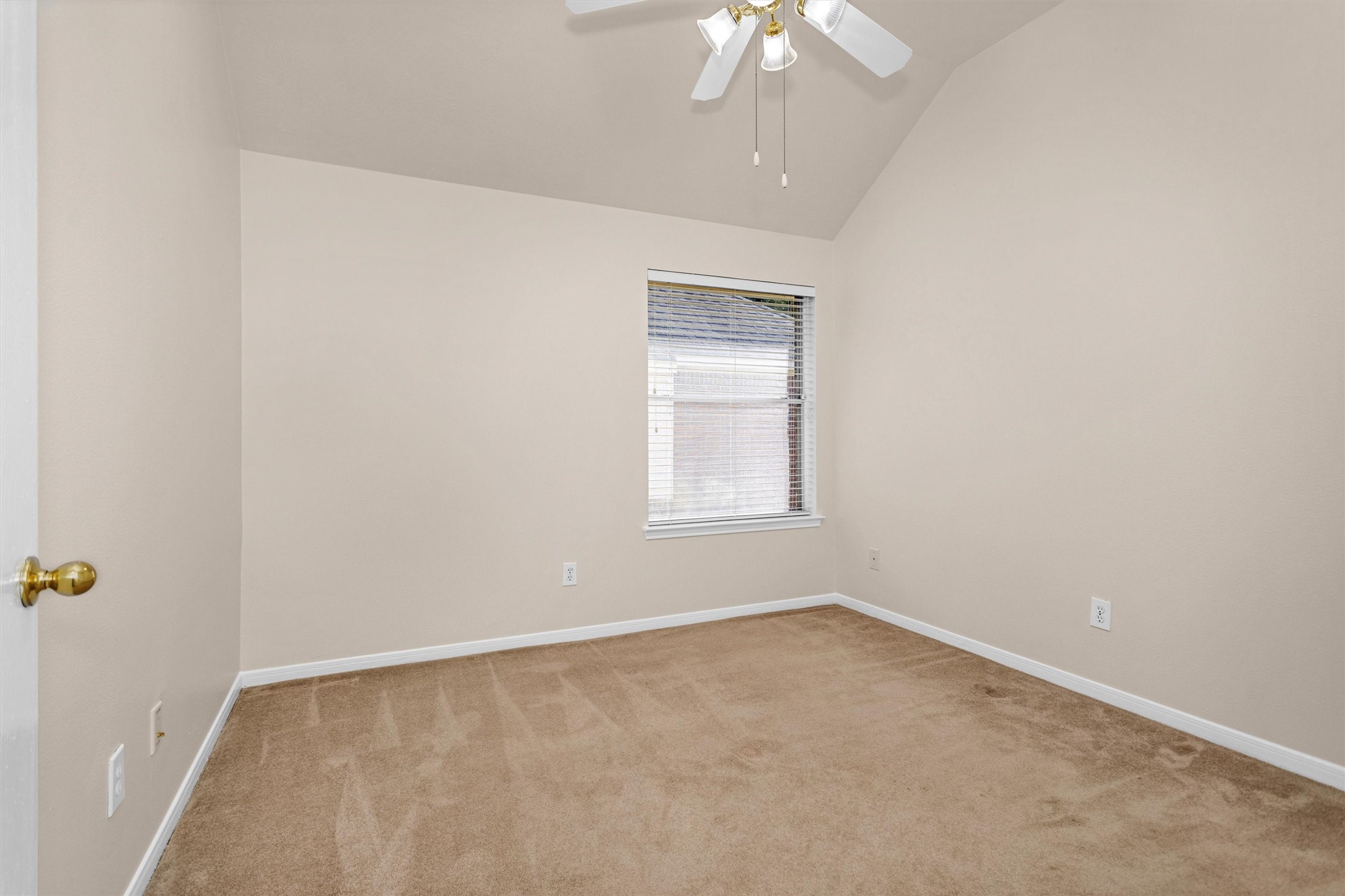 2615 Honeysuckle Walk Spring, TX 77388 - Photo 28 of 39 an empty room with a chandelier fan and windows