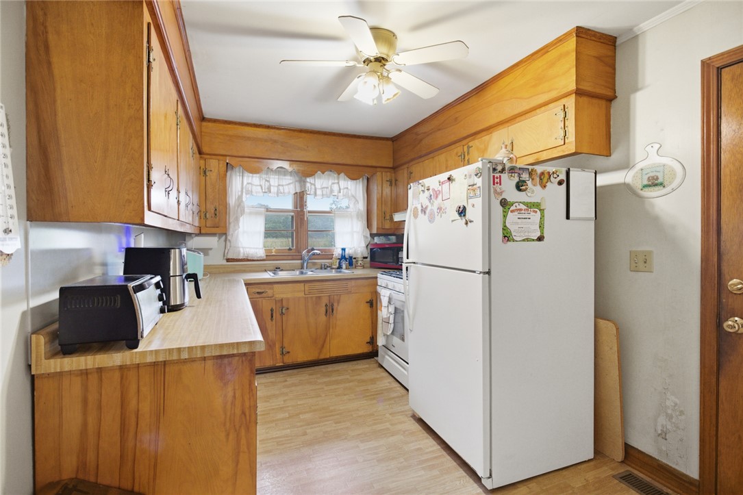 282 West Bennett Road Westminster, SC 29693 - Photo 7 of 42 This spacious kitchen offers a functional layout with ample cabinetry and plenty of natural light.