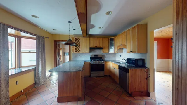 $439,900 | 102 Woodland Avenue, Gilford, NH 03249