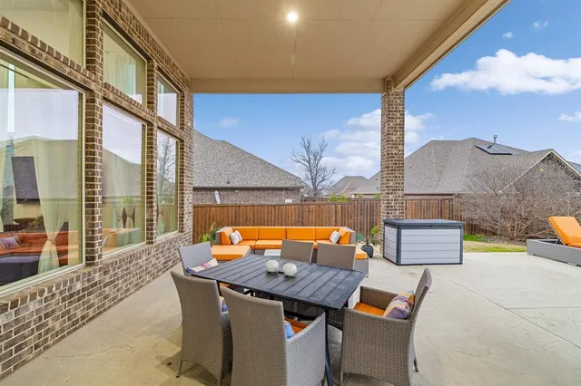 a outdoor space with patio couch and table