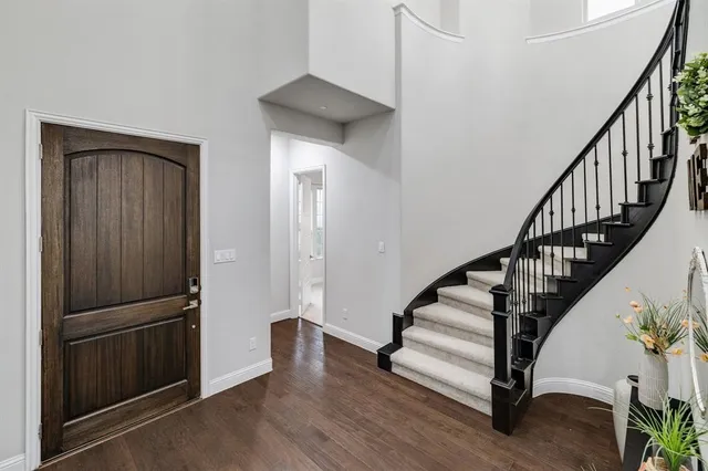 a view of entryway with wooden floor