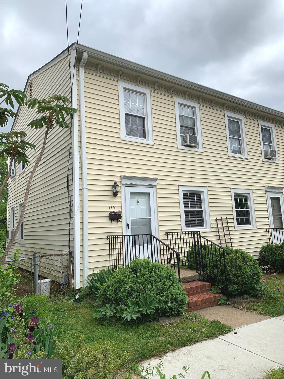 113 Hawke Street Fredericksburg, VA 22401 - Photo 1 of 10 a front view of a house with a yard