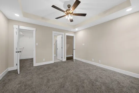 a view of storage and utility room with racks on the wall