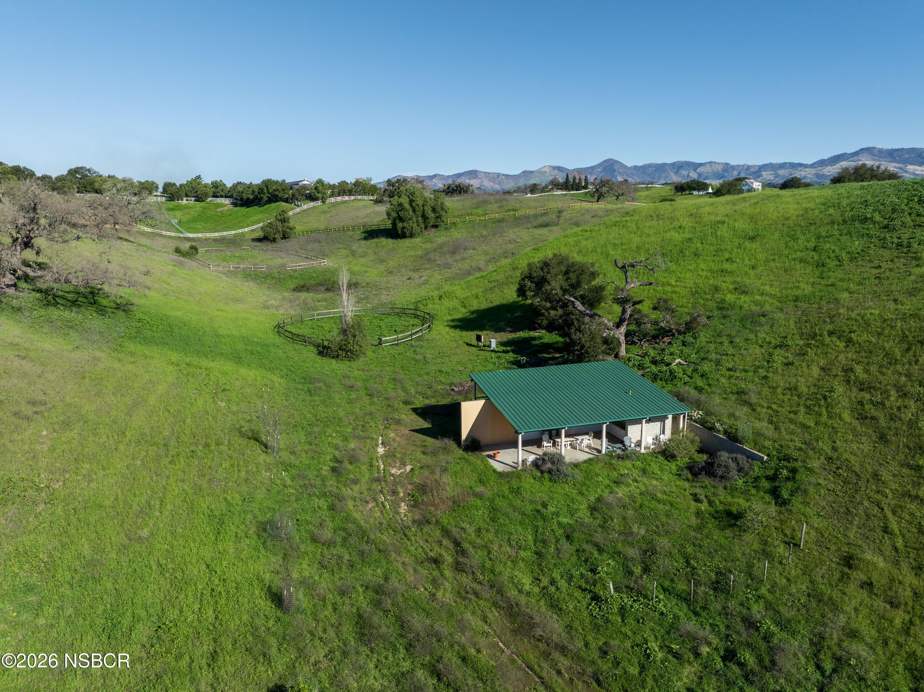 2865 North Refugio Road Santa Ynez, CA 93460 - Photo 17 of 37 a view of a grassy area with an ocean