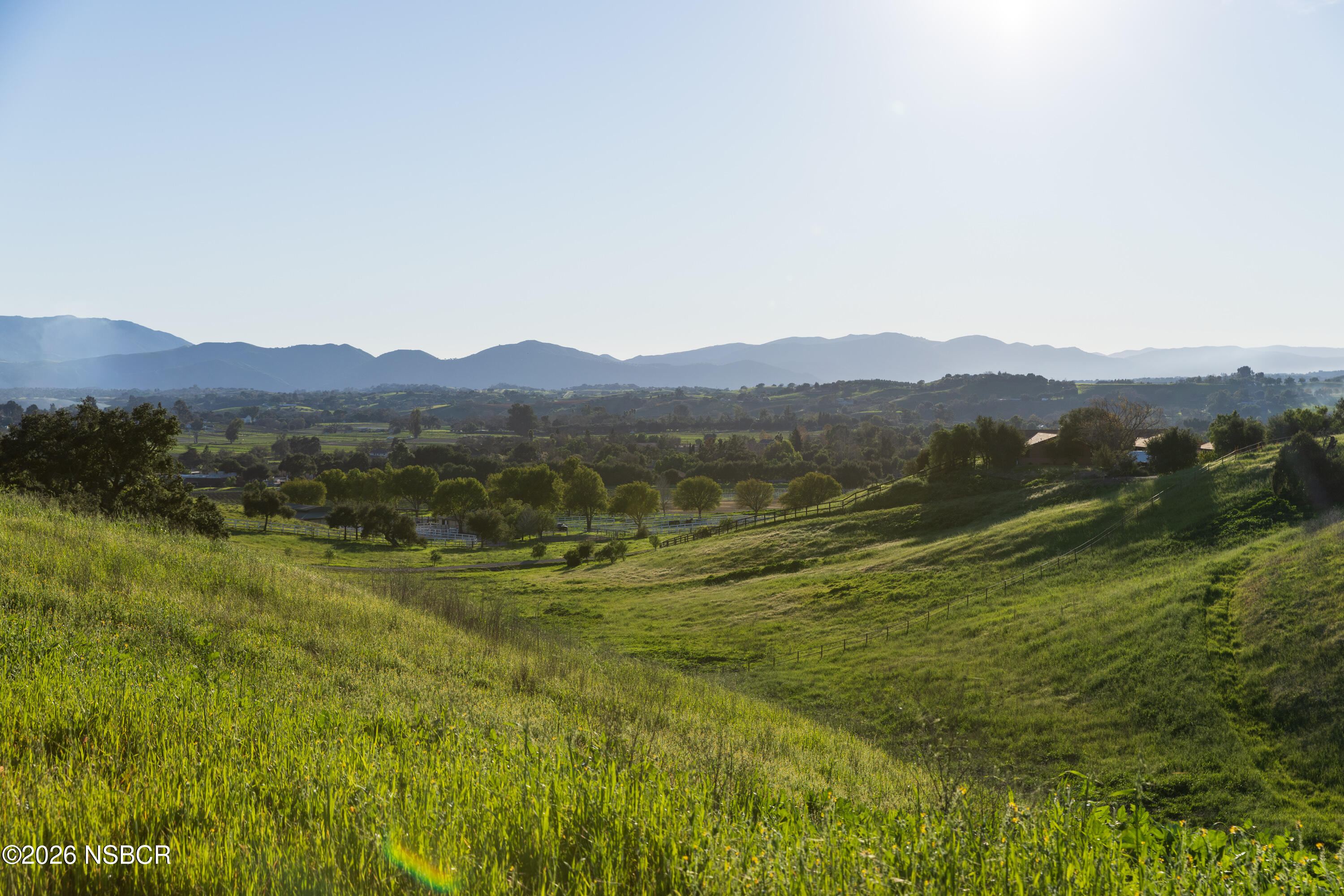 2865 North Refugio Road Santa Ynez, CA 93460 - Photo 2 of 37 a view of a town with mountains in the background