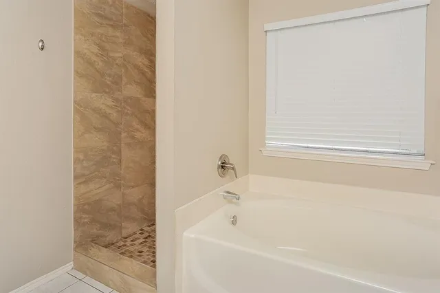 a bathroom with a bathtub