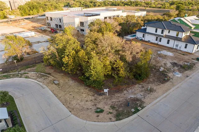 a view of a swimming pool with a yard