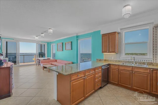a room with a sink and cabinets