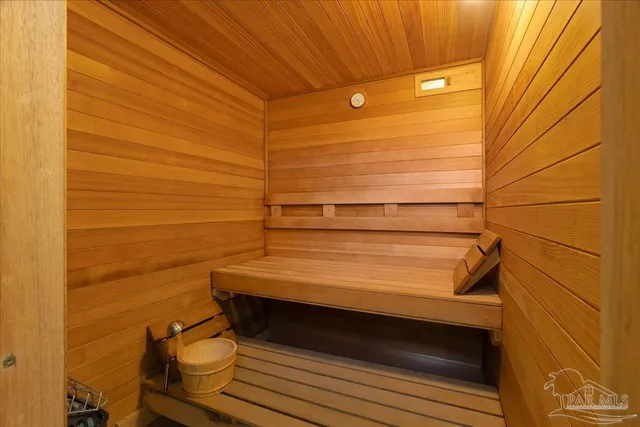 an outdoor space with lots of water fountain and lots of trees