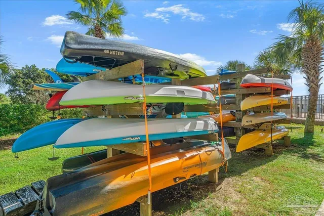 a car parked in front of a tall building