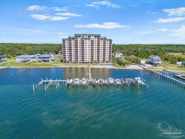 a view of a lake with a big yard