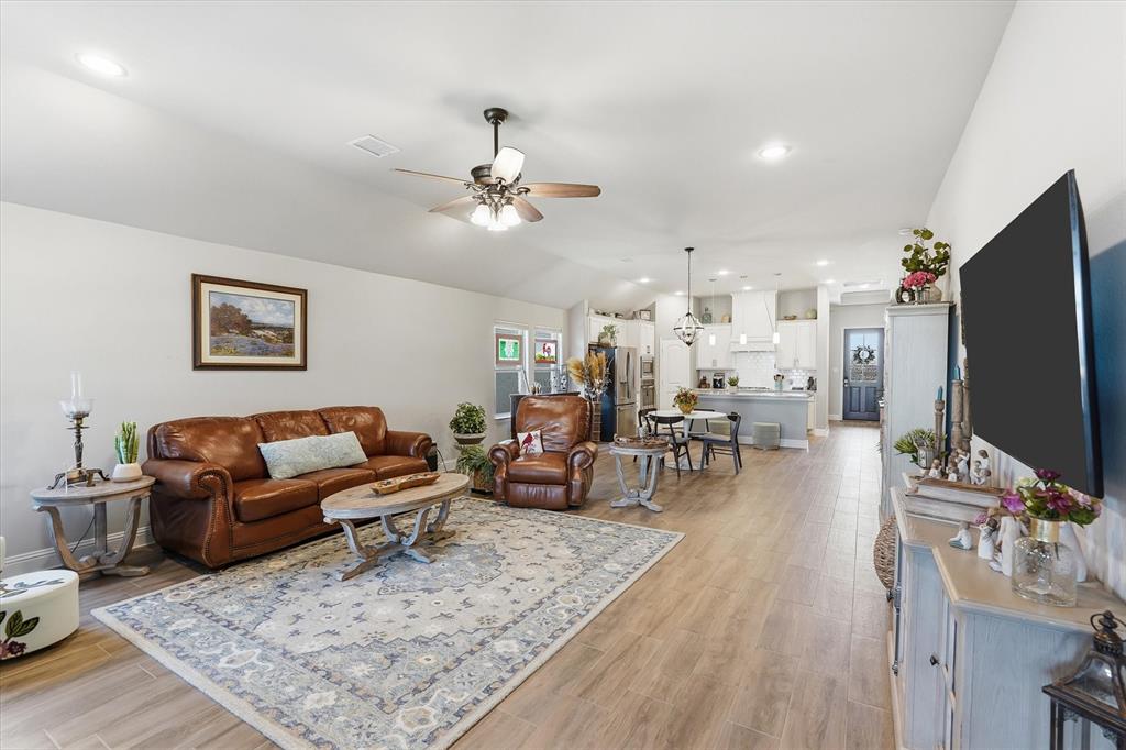 813 Mildren Lane Fate, TX 75087 - Photo 9 of 32 All ceilings throughout the home are 10' and the windows and recessed lighting make for light, bright and wide-open feel, which is great for entertaining!