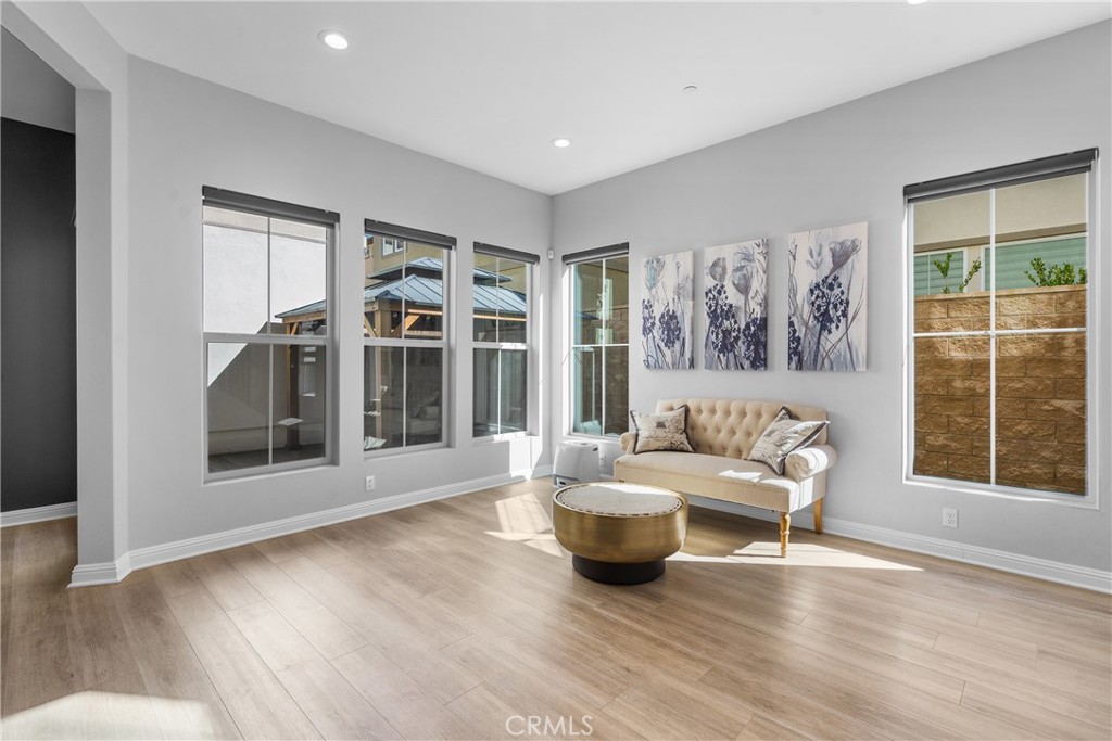 20809 Acorn Circle Porter Ranch, CA 91326 - Photo 12 of 57 a living room with furniture and large window