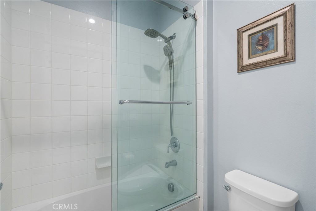 20809 Acorn Circle Porter Ranch, CA 91326 - Photo 14 of 57 a bathroom with a shower and toilet