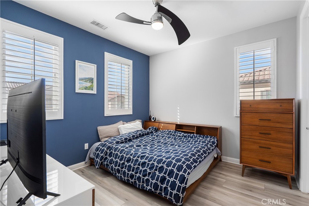 20809 Acorn Circle Porter Ranch, CA 91326 - Photo 29 of 57 a bedroom with a bed and a window