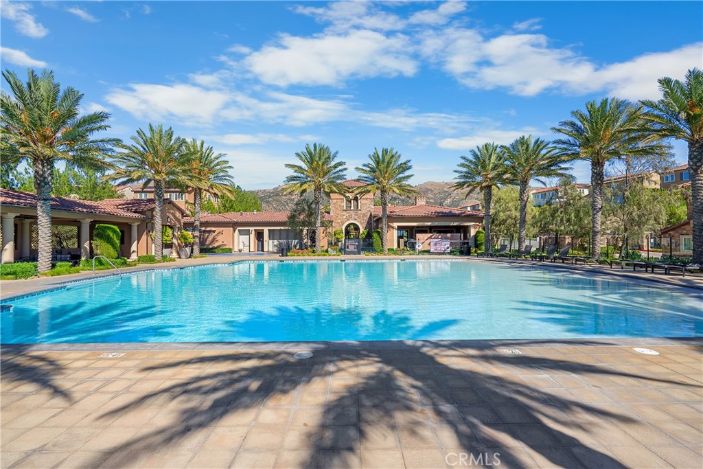 20809 Acorn Circle Porter Ranch, CA 91326 - Photo 52 of 57 a view of a lake with a house in the background