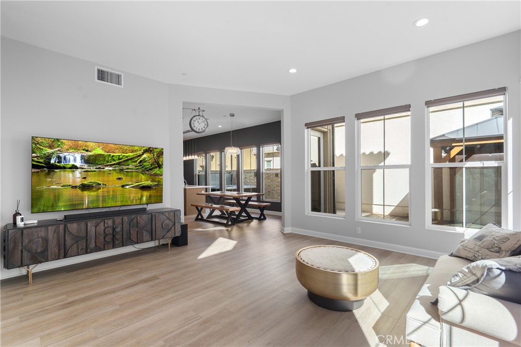 20809 Acorn Circle Porter Ranch, CA 91326 - Photo 8 of 57 a living room with furniture and a flat screen tv