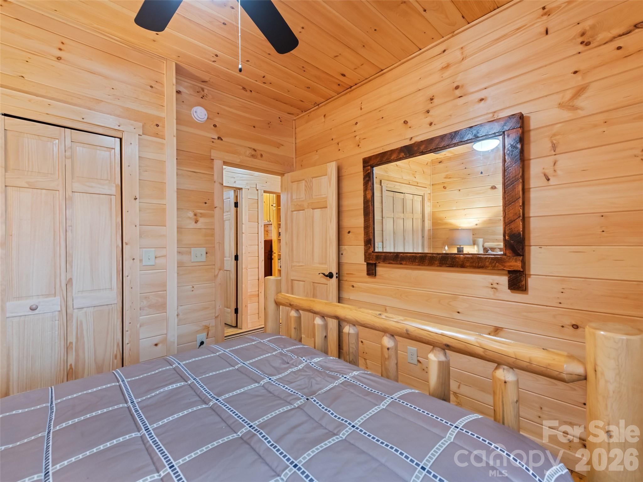 693 High Splendor Drive Robbinsville, NC 28771 - Photo 19 of 48 a bathroom with a sink and a large mirror