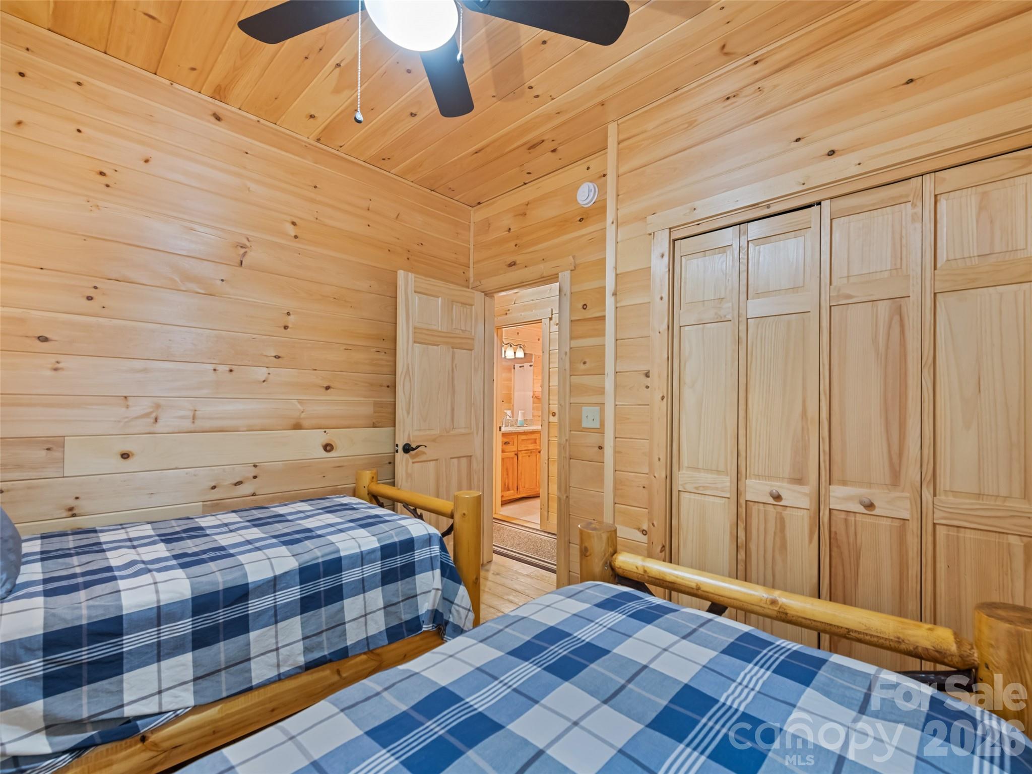 693 High Splendor Drive Robbinsville, NC 28771 - Photo 22 of 48 a bedroom with a bed and a shower