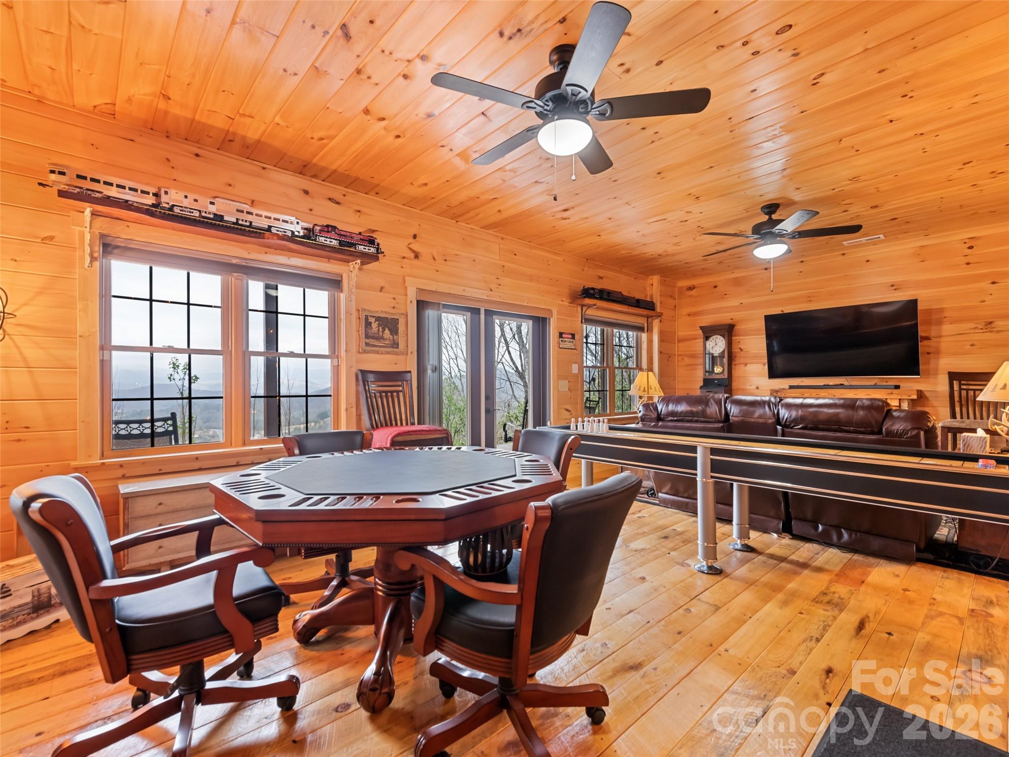 693 High Splendor Drive Robbinsville, NC 28771 - Photo 34 of 48 a dining room with furniture and wooden floor
