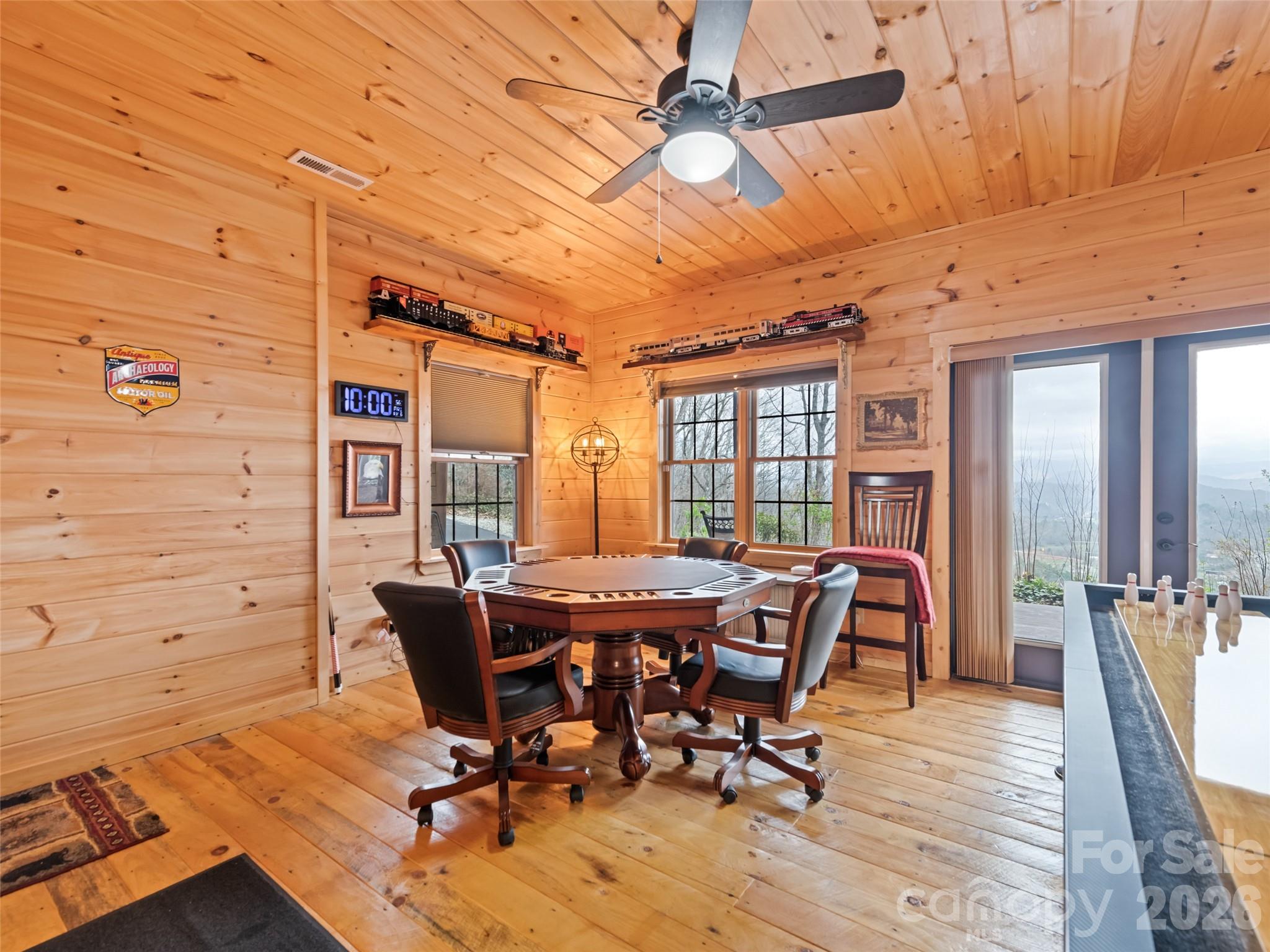 693 High Splendor Drive Robbinsville, NC 28771 - Photo 37 of 48 a view of a dining room with furniture window and wooden floor