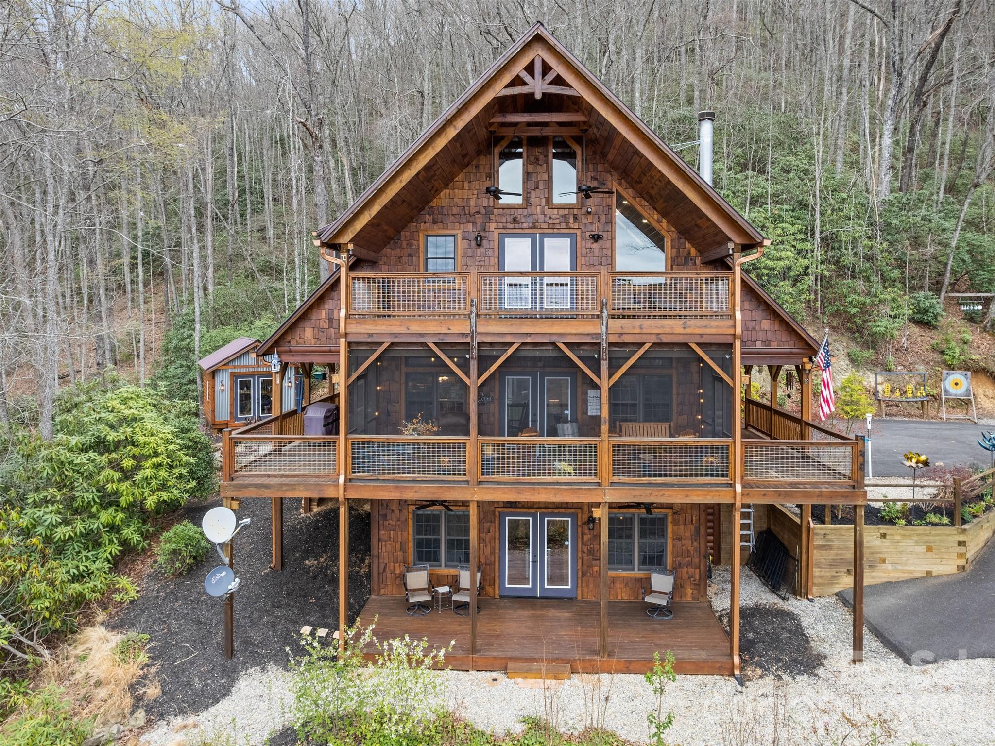 693 High Splendor Drive Robbinsville, NC 28771 - Photo 42 of 48 a front view of a house with a yard