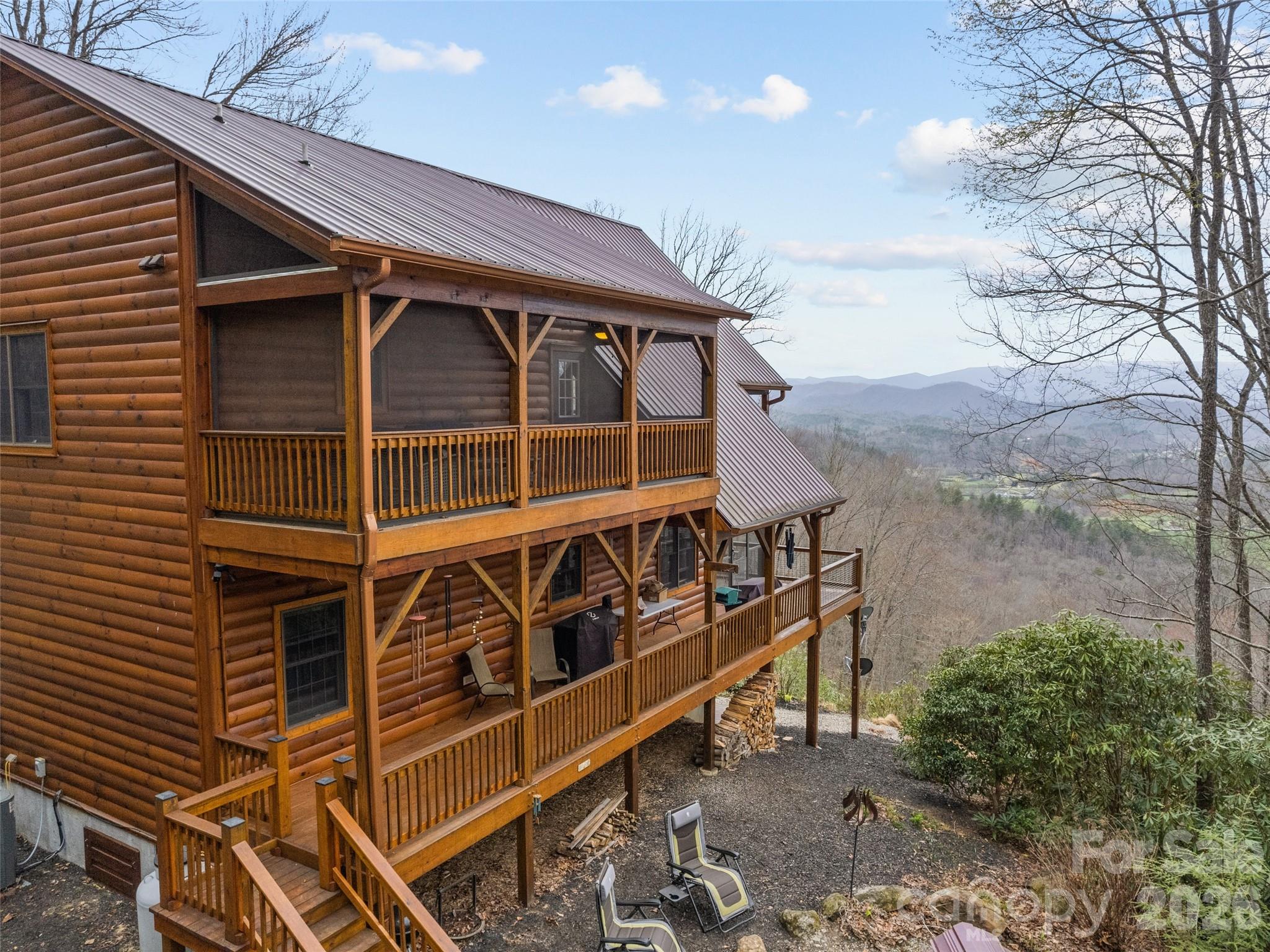 693 High Splendor Drive Robbinsville, NC 28771 - Photo 45 of 48 a front view of a house with a yard