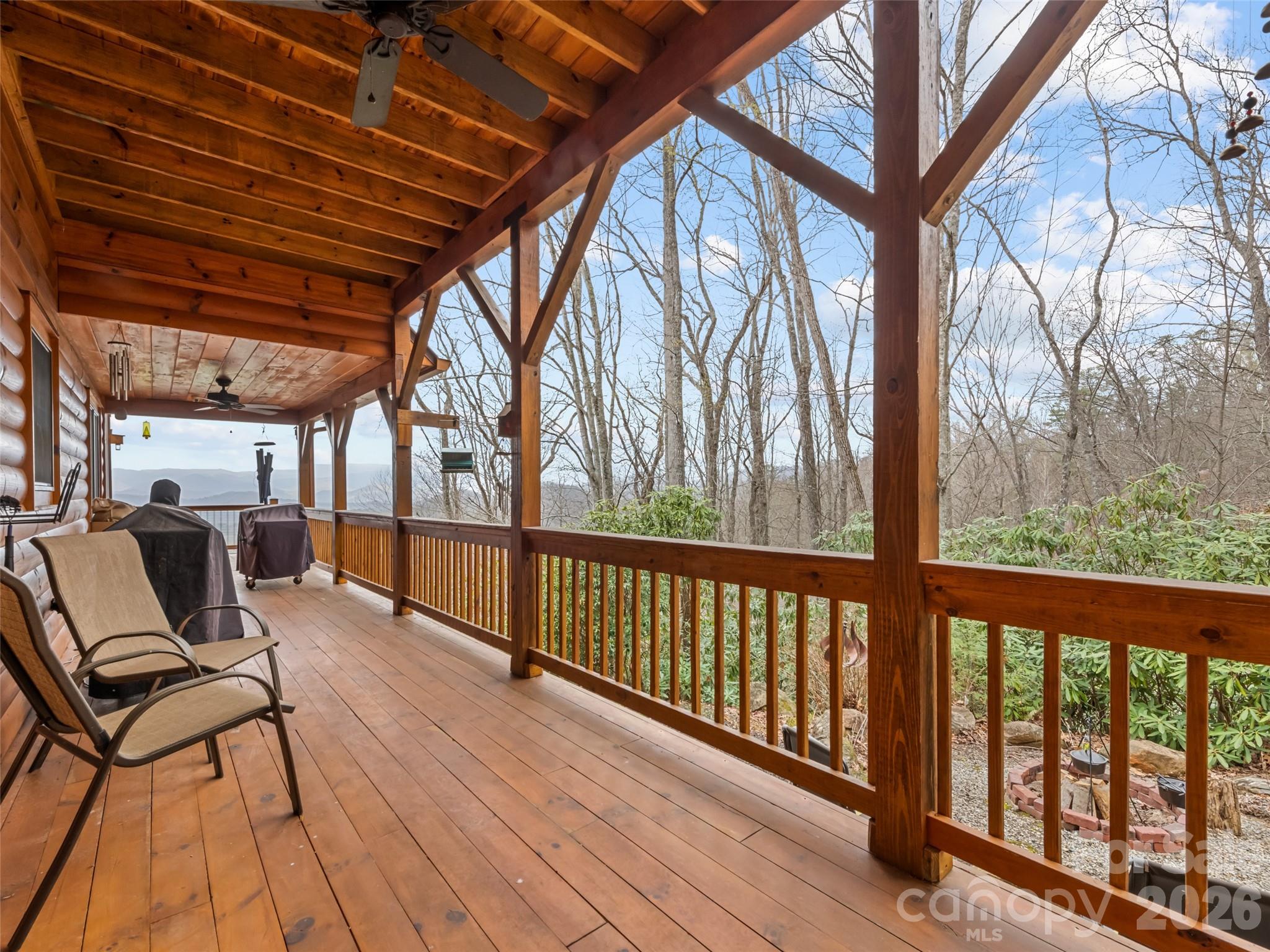 693 High Splendor Drive Robbinsville, NC 28771 - Photo 46 of 48 a view of a chairs and tables in the balcony