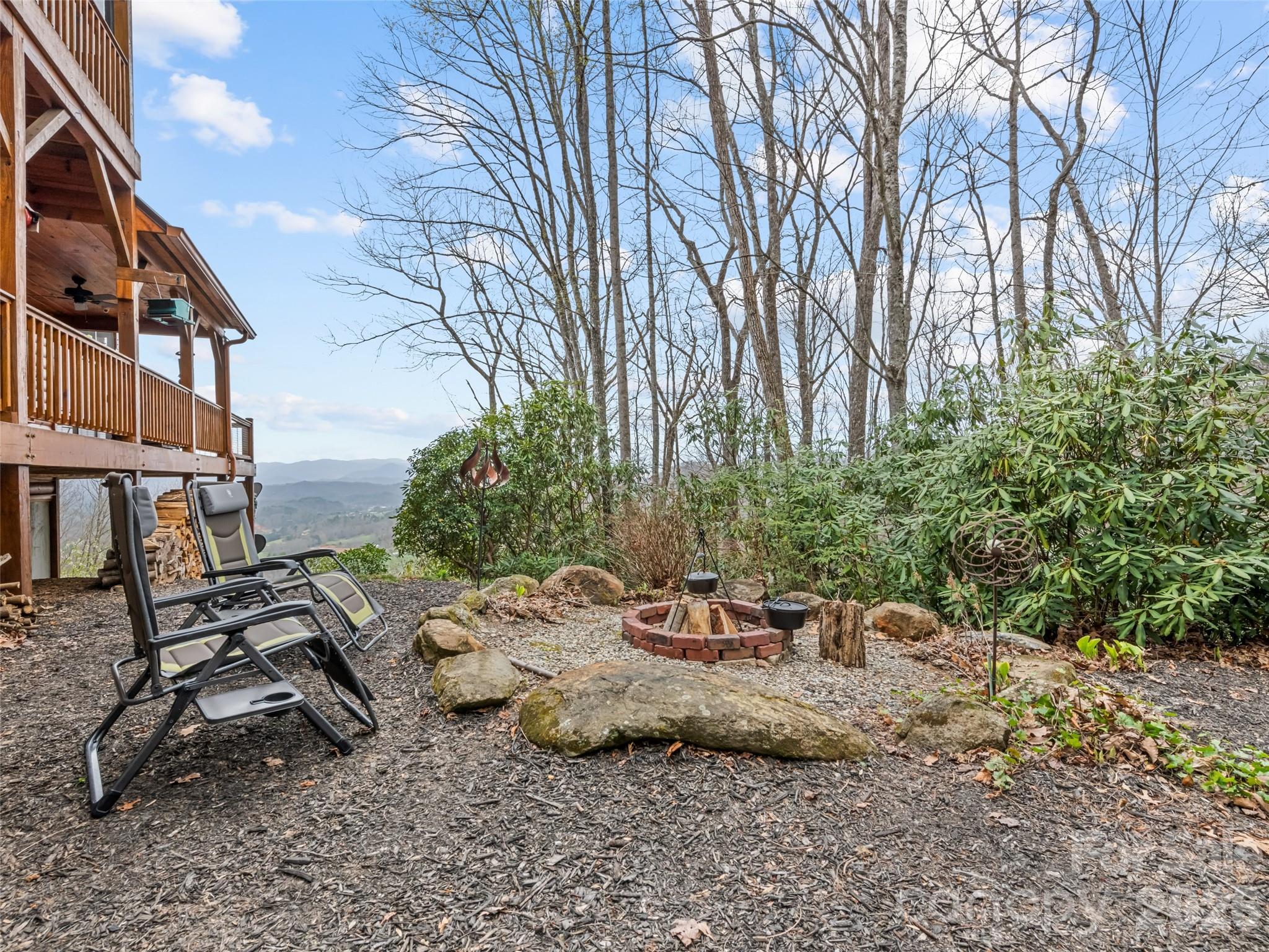 693 High Splendor Drive Robbinsville, NC 28771 - Photo 47 of 48 a view of a backyard with a sitting area