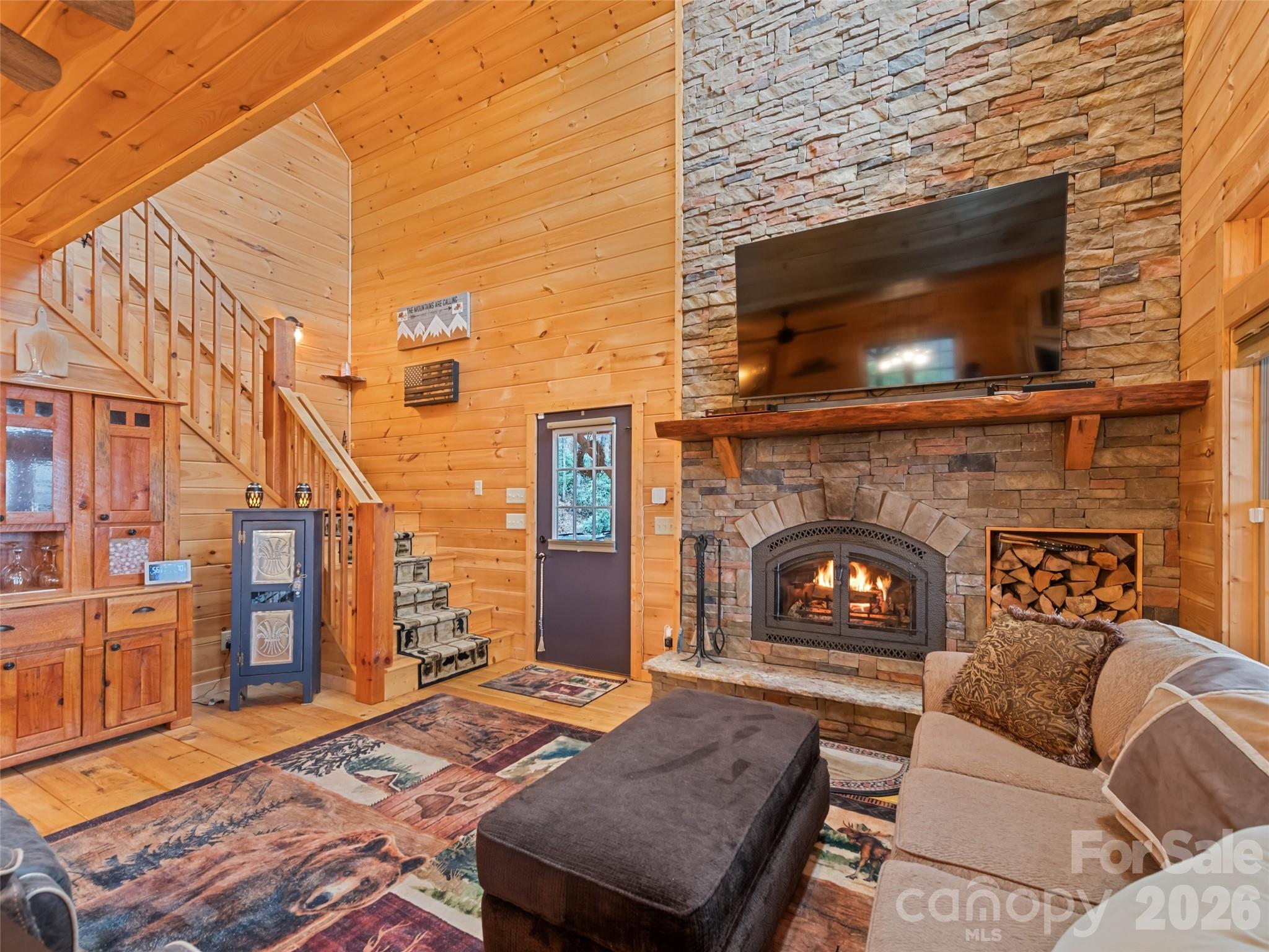 693 High Splendor Drive Robbinsville, NC 28771 - Photo 5 of 48 a living room with furniture and a fireplace