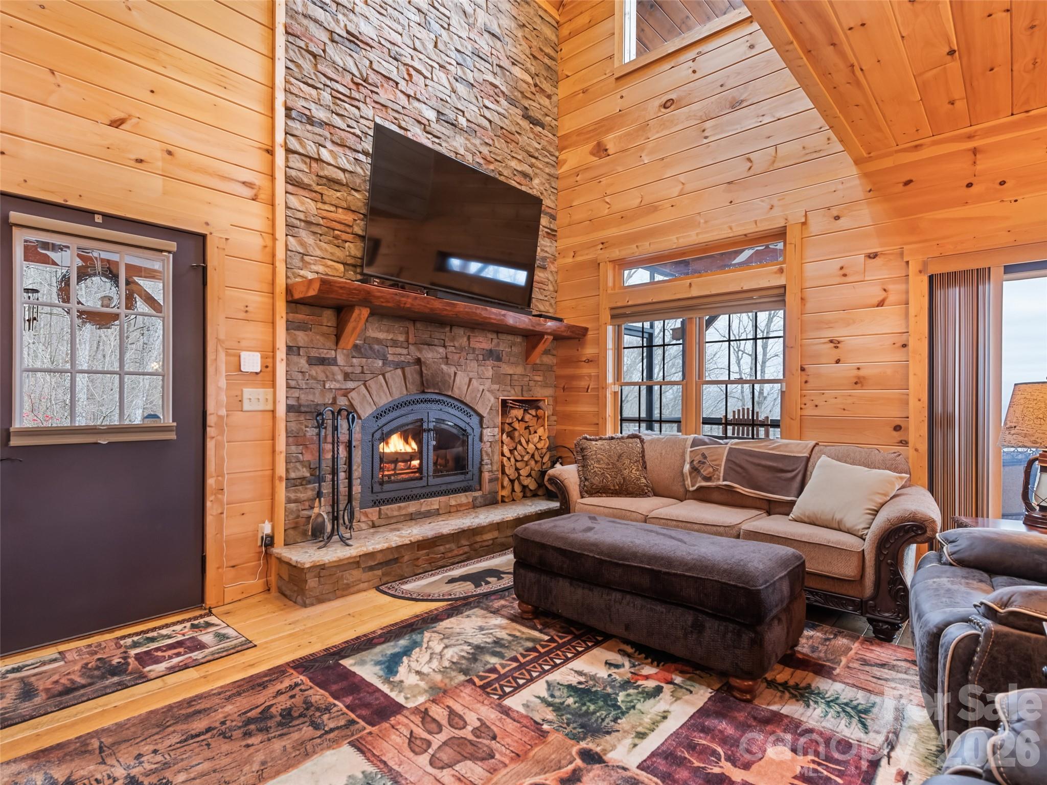 693 High Splendor Drive Robbinsville, NC 28771 - Photo 6 of 48 a living room with furniture and a fireplace