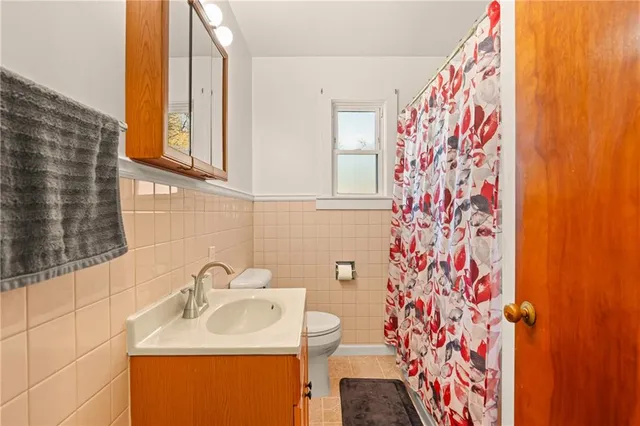 a bathroom with a sink and shower