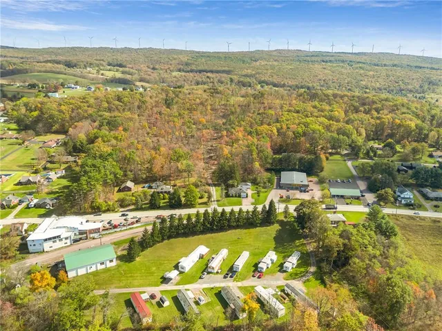 a view of an aerial view of residential houses with outdoor space