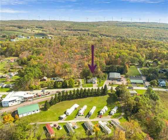 a view of an aerial view of residential houses with outdoor space